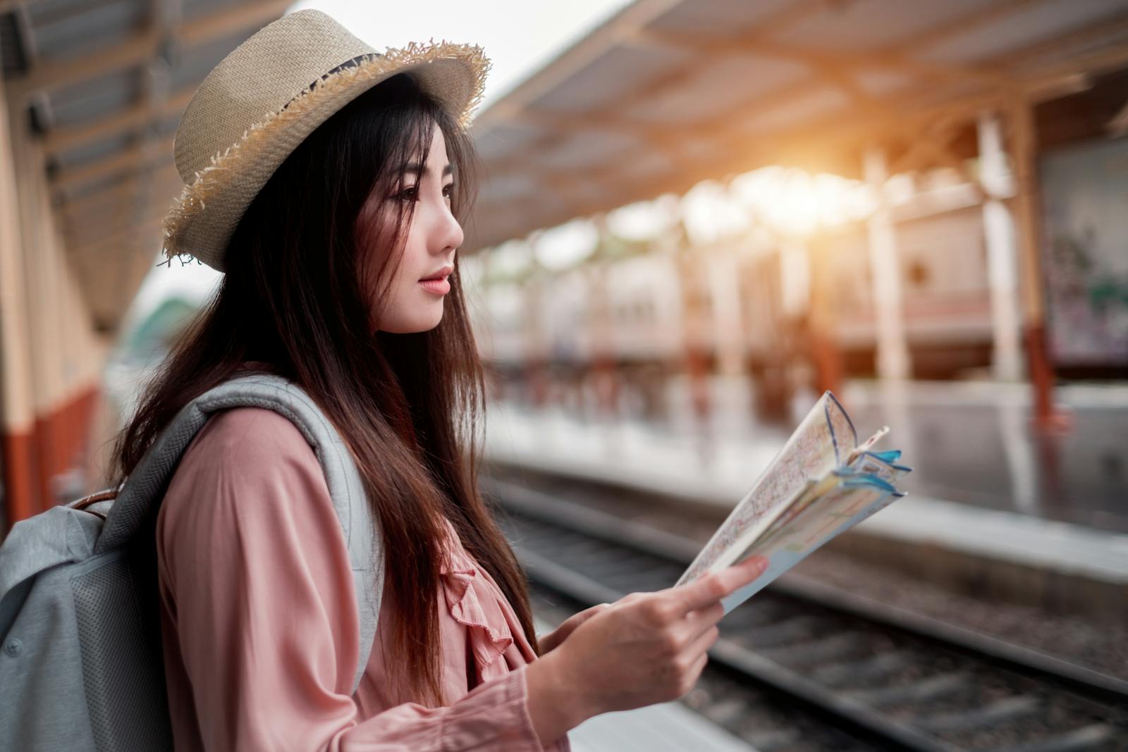 Woman Traveler looking at a map 