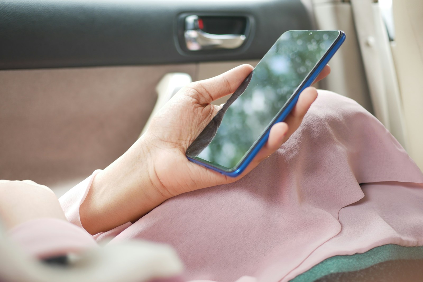 Person using a smartphone for travel planning