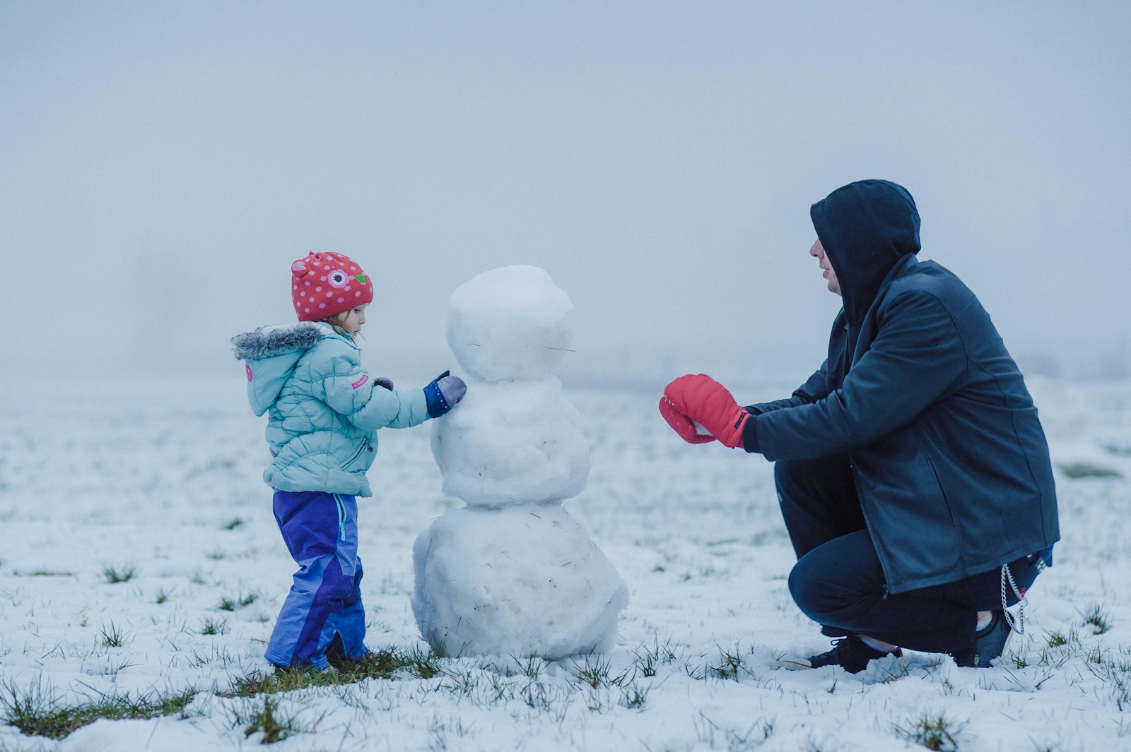 Family enjoying winter activities